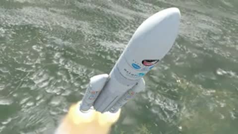 Aerial shot of the rocket climbing over varied landscape