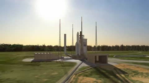 Static wide shot of the Ariane 5 rocket on the launch pad at dawn