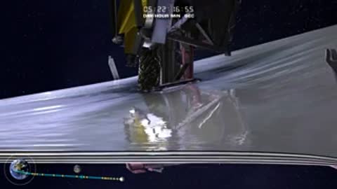 Close-up animation of shiny silver sunshield sheets smoothing out.
