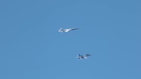 X-59 aircraft in flight accompanied by chase plane.