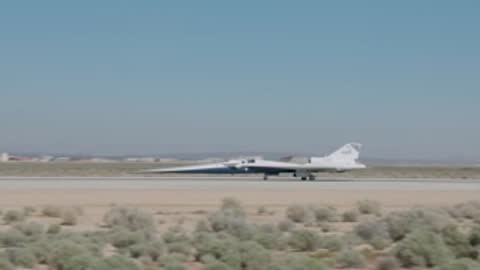 X-59 aircraft landing on runway at airfield.