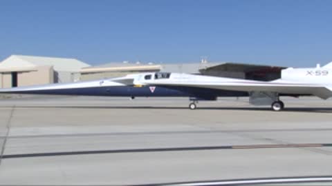 X-59 aircraft being towed or moving slowly on tarmac.