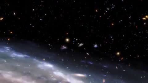 Animated visualization of a spiral galaxy rotating in outer space against stars.