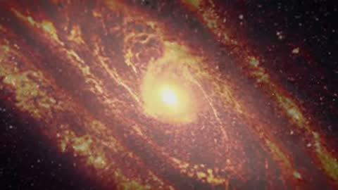 Animated view of a bright glowing spiral galaxy in deep space with gas clouds.