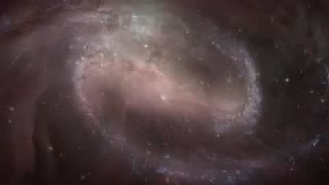 Space telescope imagery of a bright barred spiral galaxy and dust clouds.