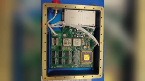 Open electronic component enclosure showing internal circuit boards.