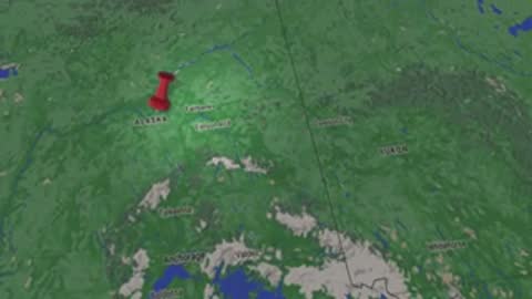 A digital map displays a location marker over a green region.