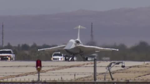 Front view of the X-59 aircraft taxiing towards the camera.