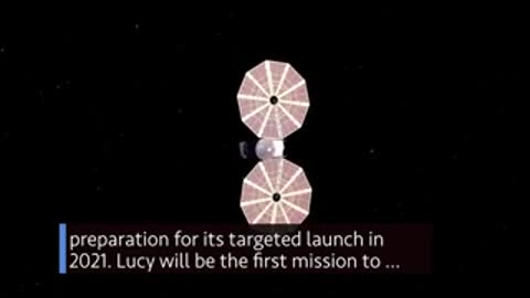 Lucy spacecraft approaching Trojan asteroid target in deep space animation.