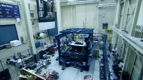 High angle view of a large mechanical test fixture in a facility