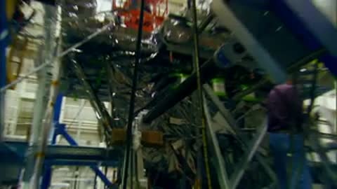 Close-up view of mechanical linkages and attachments being tested