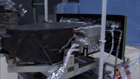 Antenna array positioned next to a piece of covered hardware