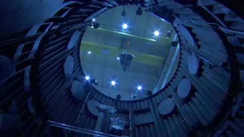 Inside view looking down a large cylindrical thermal vacuum chamber