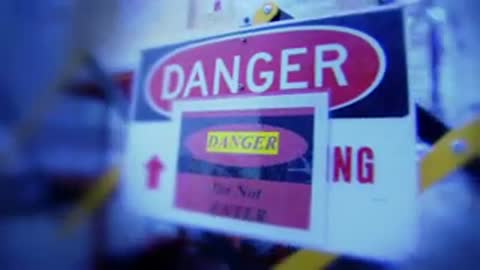 Nitrogen tanks, a danger warning sign, and a pipe apparatus in a facility