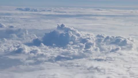 Aerial view of cloud formations and sky from high altitude