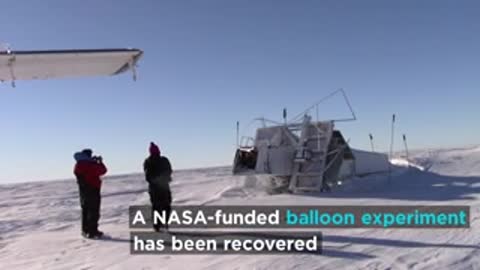 Recovered NASA-funded balloon experiment resting in snow in Antarctica.