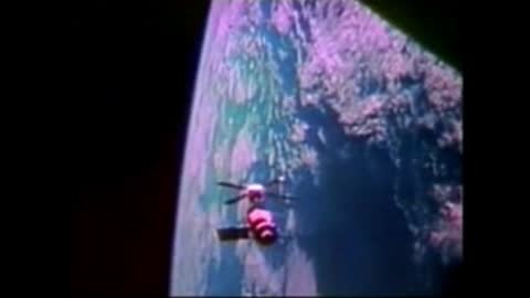 Stylized artistic depiction of space and Earth with an object over the planet