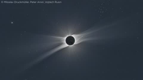 Clear black and white photograph of a total solar eclipse showing the corona