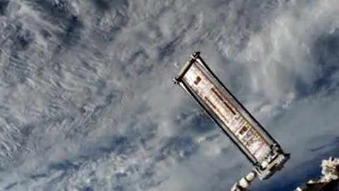 Exterior view of solar array over clouds.