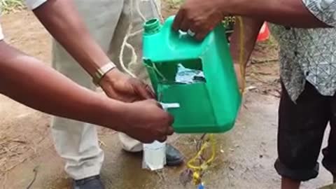 People testing water filtration outdoors.