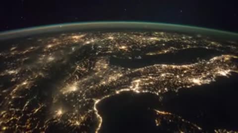 Nighttime city lights viewed from space.