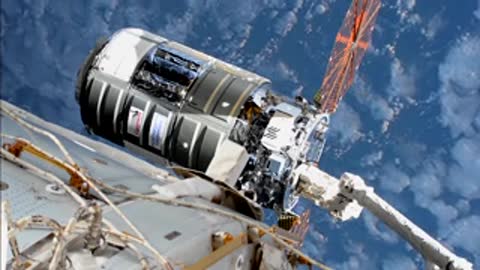 Cargo spacecraft docked to ISS exterior.