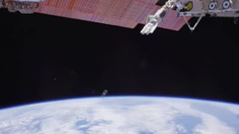 Small satellite or debris floating in orbit.