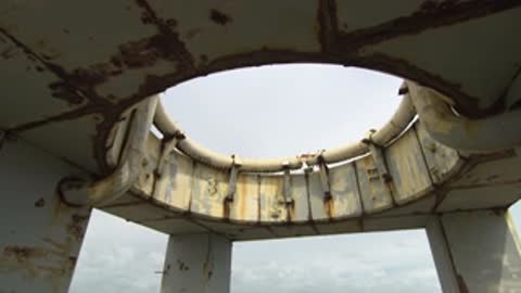 Under-roof view looking up through the circular concrete opening