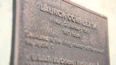 Extreme close-up of text on a memorial plaque.