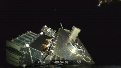 Satellite unfolds its solar panels in space.