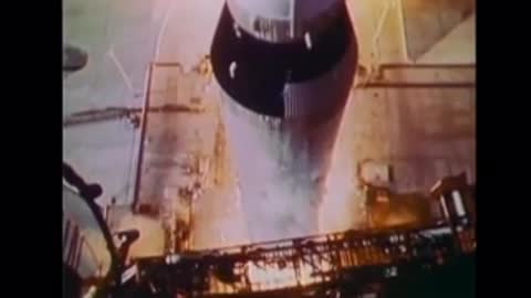 Close-up shot of a rocket test firing with intense flame and exhaust smoke.