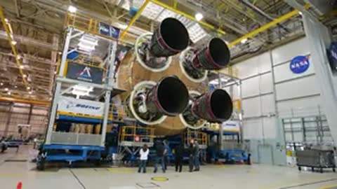 Four rocket engines installed on the core stage within assembly floor.