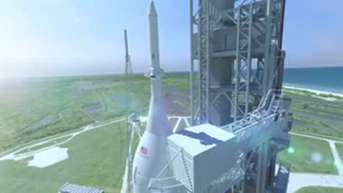 aerial tracking shot moving along side of rocket on launch pad