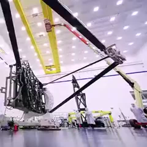 Time-lapse of technicians assembling the golden hexagonal mirrors of the James Webb Space Telescope.