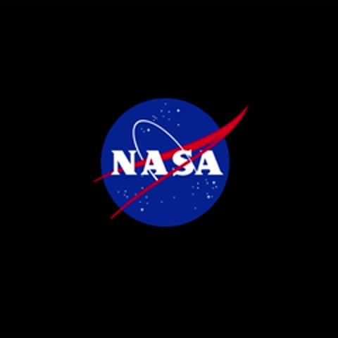 NASA logo with white text and red vector on a blue circular background.