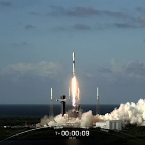 Rocket ascending into the sky leaving a white smoke trail behind.