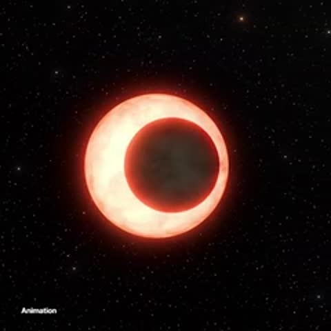 Animation of a solar eclipse followed by a large optical telescope inside a dome.