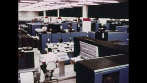 high-angle view of large mission control center room