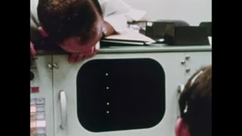 close-up of oscilloscope display showing four glowing dots