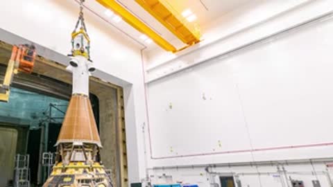 Spacecraft inside test chamber during acoustic and environmental testing setup