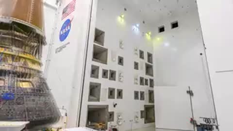 Wide shot of the Orion spacecraft positioned in the integration facility.