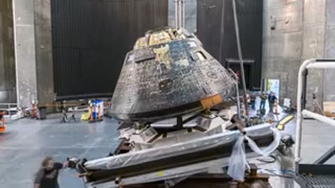Orion capsule returned to upright position on its tilting test fixture.