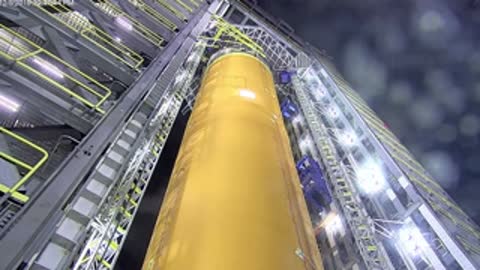 Upward tilt from tower walkway revealing Artemis I Liquid Oxygen Tank Structural Test Article.