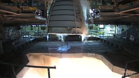 Interior view of the RS-25 engine nozzle operating steadily during the test.