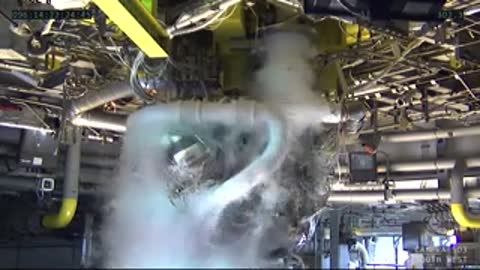 Close-up shot of engine plumbing and piping surrounded by swirling vapor.