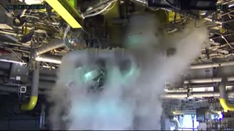 Close-up view of the plumbing and machinery of the RS-25 engine during test.
