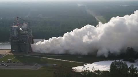 Wide view of the rocket test stand venting smoke sideways.