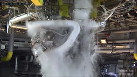 Close-up of the upper engine components enveloped in vapor.