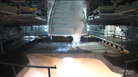 Medium view from underneath the engine firing hot exhaust.