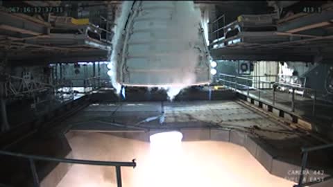Medium view of the rocket engine exhaust plume during firing.